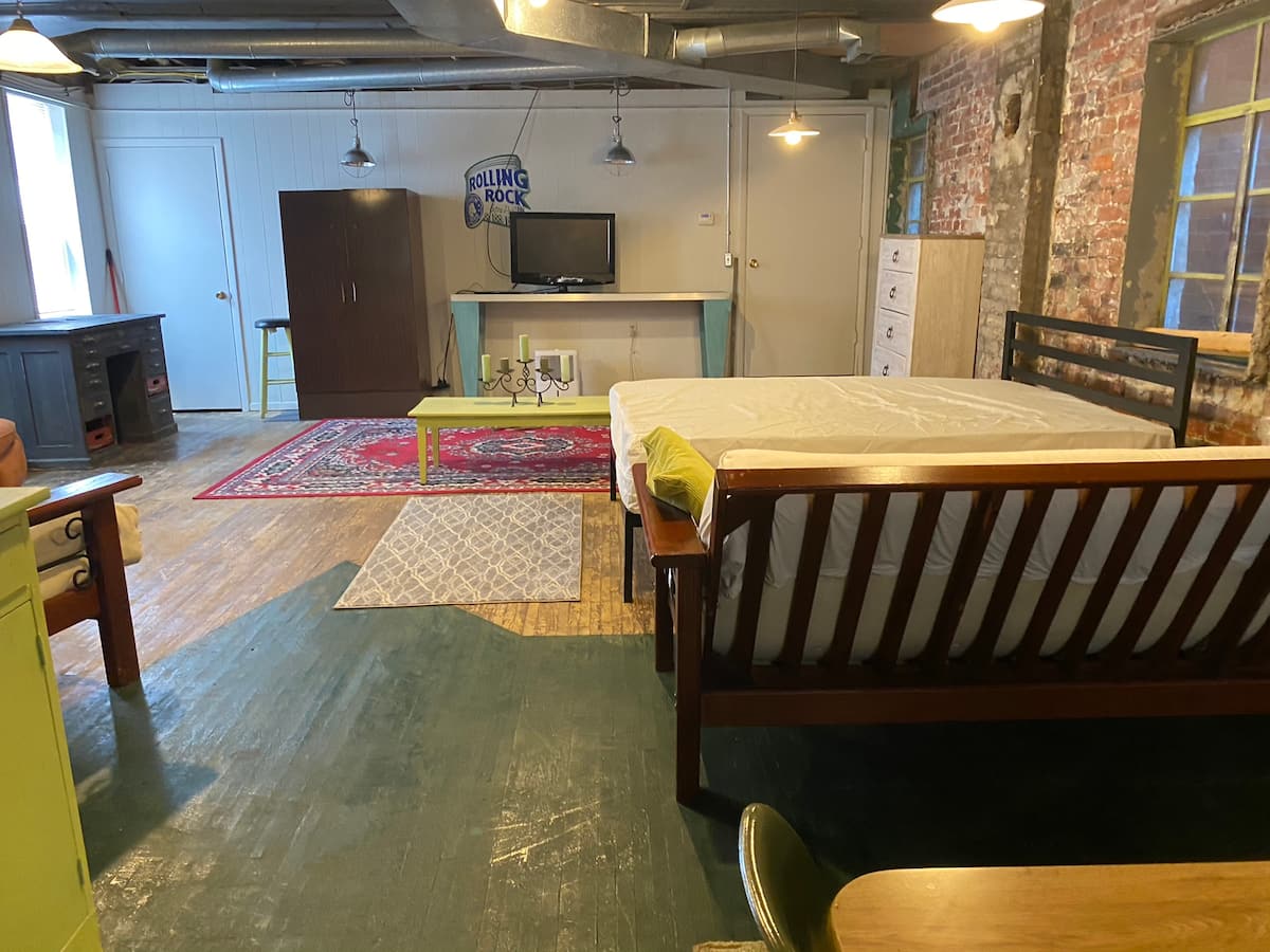 Wide view across the open studio